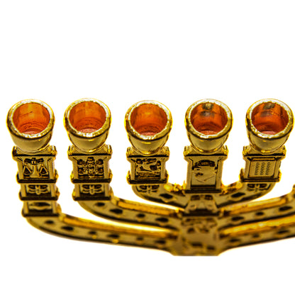 eine klassische siebenarmige Menora in einer schönen Goldfarbe. 12 cm Höhe